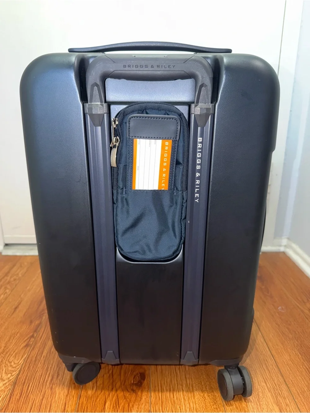 Briggs & Riley Sympatico 22” Navy Carry-On Spinner